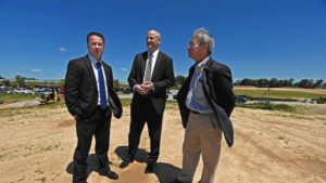 Richard Williamson, from left, Thomas Pilon, both of St. John Properties, and Michael Caruthers, president of Somerset Construction Company, the master developer of the entire Baltimore Crossroads area, are pictured at the 200+ acre integrated mixed use project, the Greenleigh at Crossroads in Baltimore County. (Kenneth K. Lam / Baltimore Sun)
