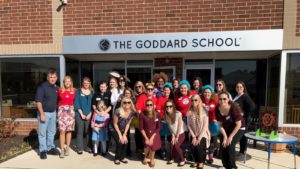 Owners and Faculty stand outside their newest location in Middle River 