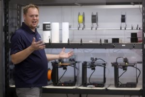 Eric Fowkes, Fortem Technologies drone architect, shows 3D printers being used to make masks for Provo police to use during the COVID-19 pandemic at Fortem Technologies in Pleasant Grove on Monday, March 30, 2020. Each printer can print two masks at a time and it takes about six hours to complete the print cycle. Kristin Murphy, Deseret News