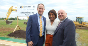 Matt Holbrook, Regional Partner, Virginia and Central Maryland Region for St. John Properties; Phyllis J. Randall, Chair At-Large of the Loudoun County Office of the Board of Directors; and Buddy Rizer, Executive Director of the Loudoun County Department of Economic Development