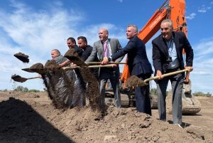 Participants ceremoniously break ground at an event to mark the start of development of the 19-acre 12th Street Exchange project in Marriott Slaterville on Sept. 29, 2022. From left, Brad Slater of the Marriott-Slaterville City Council, Brent Bailey of contractor E.K. Bailey, Mike Medina with Mountain West Commercial Real Estate, Daniel Thomas and Scott Gifford of St. John Properties and Val Hale, a former Utah economic development official. Tim Vandenack, Standard-Examiner