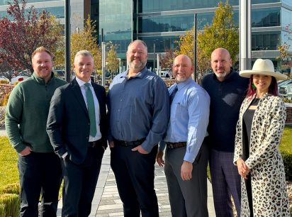 Pictured at the Valley Grove mixed-use community from left to right: Dayne Nelson, Scott Gifford, Marty Beaumont, Mark Cathemer, Daniel Thomas, and Jenessa Young.