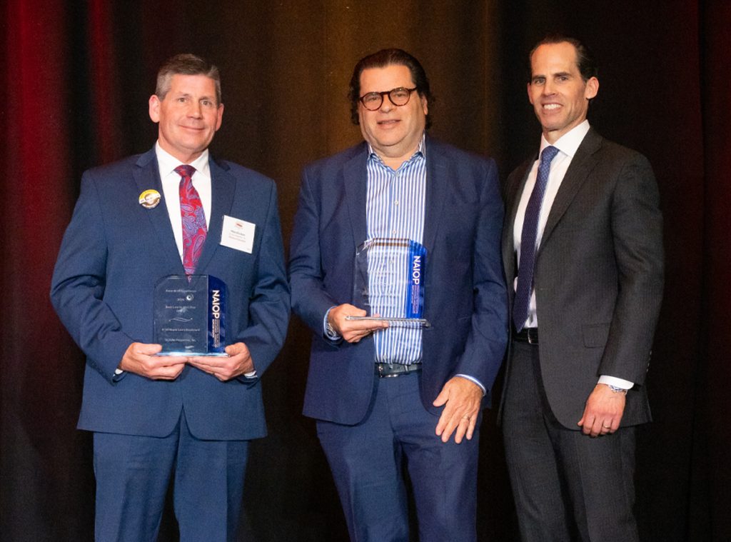 Representatives from St. John Properties and Greenebaum Enterprises accepting the Best Low to Mid-Rise Office Building award for 8150 Maple Lawn Blvd at the 2026 NAIOP Maryland Awards of Excellence